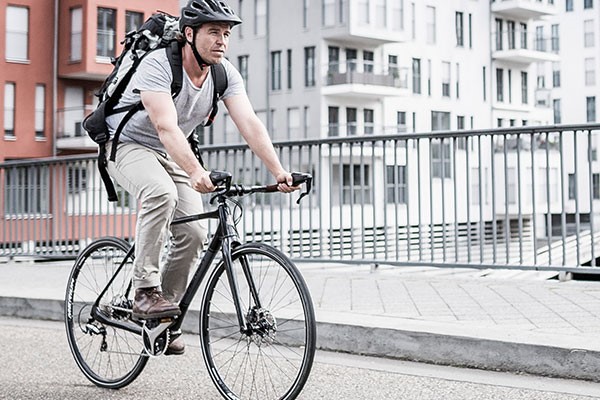 Urban cyclist on a hybrid bike under £500